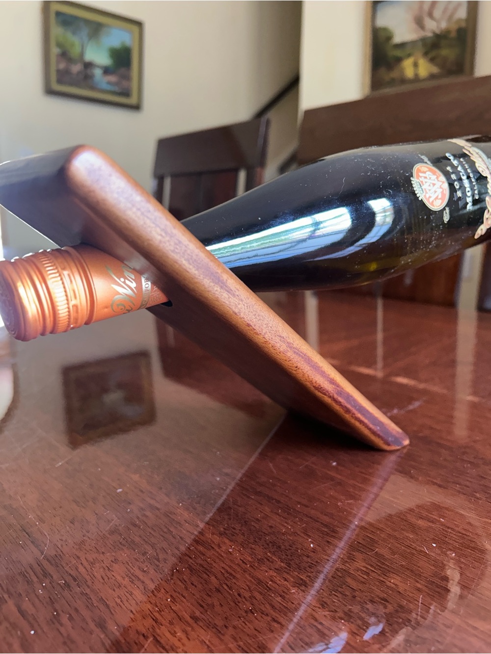 Wooden Balancing Wine Bottle Holder in Copper-Tone Finish